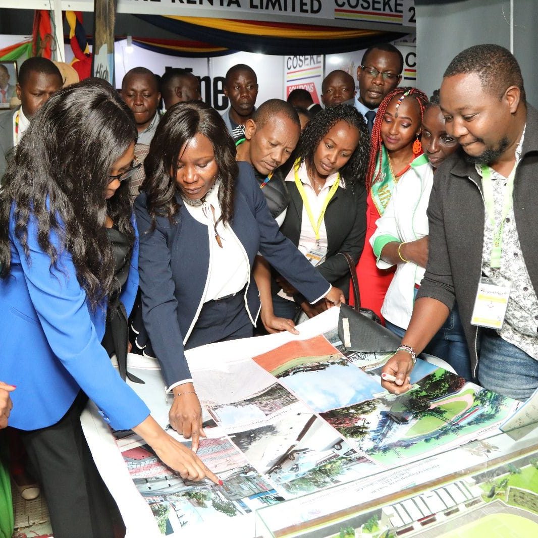Governors Susan Kihika and Cecily Mbarire observing an exhibit at the 2023 Devolution Conference, Aug 15-19